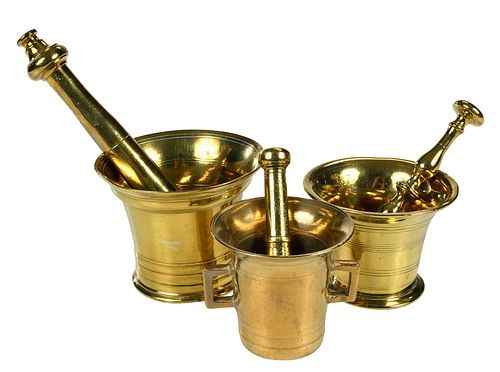 THREE GEORGIAN BRASS MORTARS AND