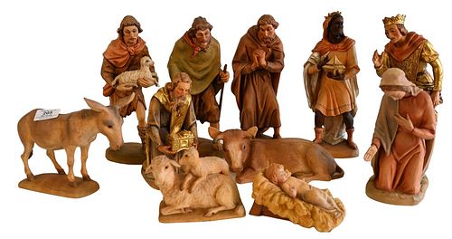 ELEVEN PIECE GROUP OF CARVED ANRI