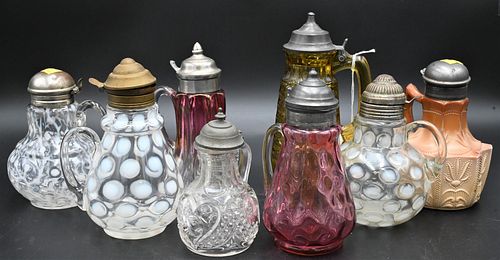 GROUP OF EIGHT GLASS SYRUP PITCHERSGroup 37647a