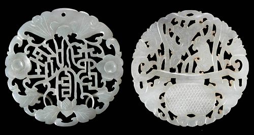 TWO CHINESE JADE CARVED ROUND PENDANTSpale