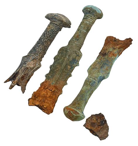 THREE BRONZE ANCIENT SWORD HANDLES