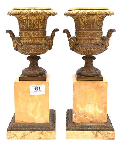 PAIR OF GRAND TOUR URNS, ON SIENNA