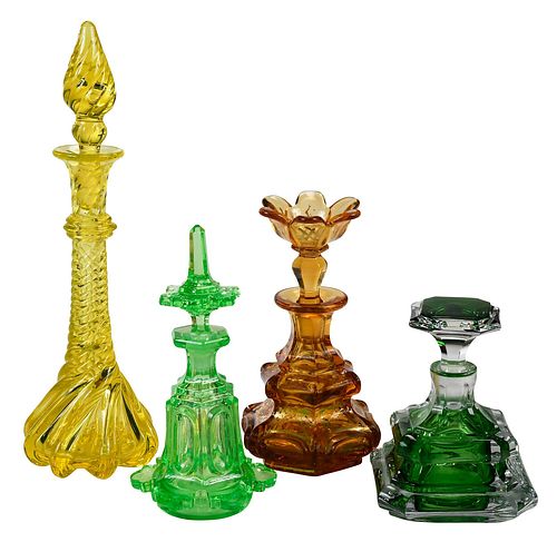 FOUR MOLDED AND CUT GLASS COLORED