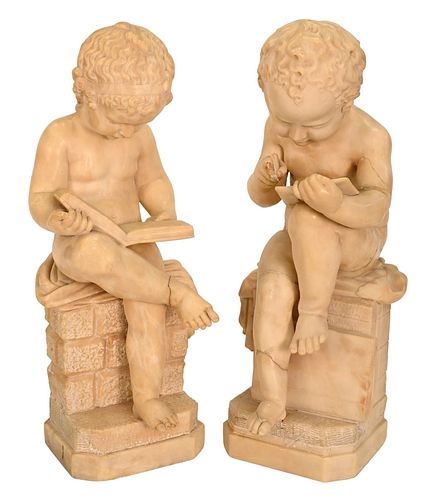 PAIR OF CARVED MARBLE FIGURES, BOY AND