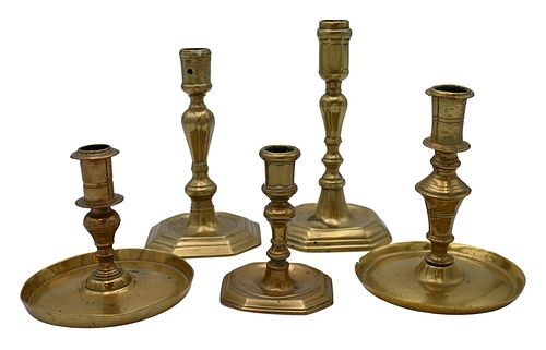 FIVE EARLY BRASS CANDLESTICKS,