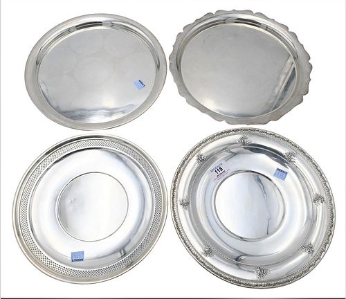 FOUR STERLING SILVER ROUND PLATES,