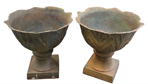 PAIR OF CAST IRON OUTDOOR PLANTERS  379b81