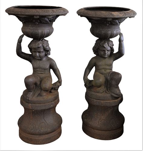 PAIR OF CAST IRON FIGURAL TWO PART
