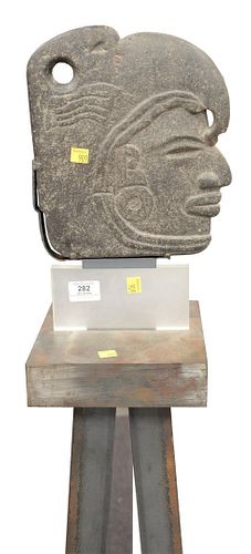 CARVED STONE BUST OF A DEITY WEARING 379e23