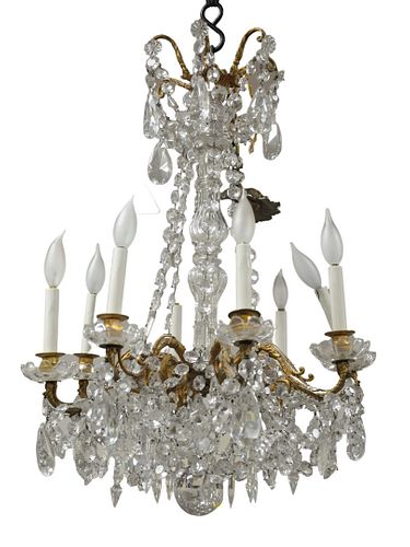 EIGHT LIGHT CRYSTAL AND BRASS CHANDELIER,