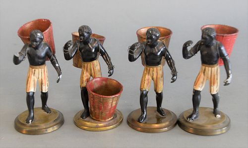 FOUR BLACKAMOOR FIGURES CARRYING