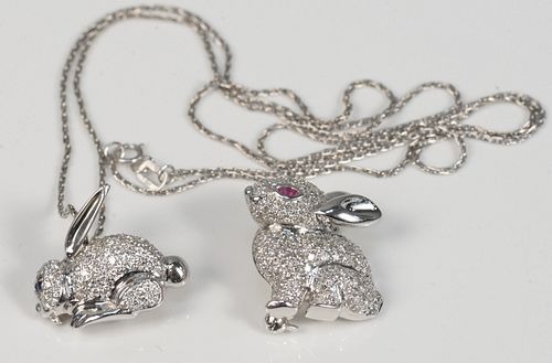 TWO 18 KARAT WHITE GOLD RABBIT