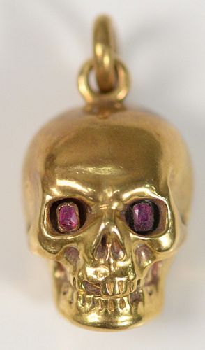 18 KARAT GOLD SKULL CONTAINER WITH