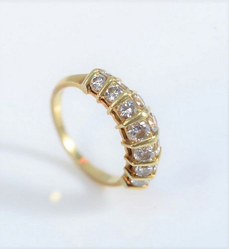 18 KARAT YELLOW GOLD RING SET WITH 37abbb