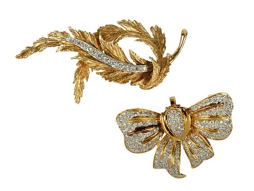 TWO GOLD AND DIAMOND BROOCHESbow