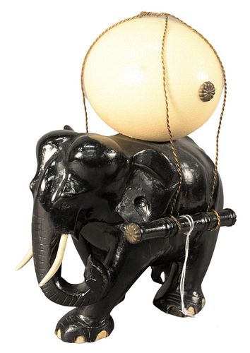 WOOD CARVED ELEPHANT, IN EBONIZED LACQUER