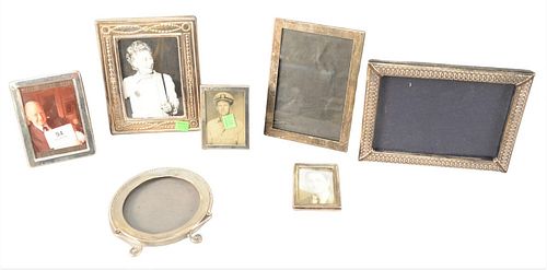 SEVEN STERLING SILVER FRAMES. LARGEST