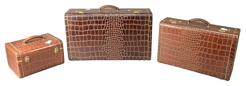 SET OF THREE LLEATHER TRAVEL SUITCASES  378ef0