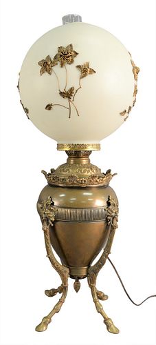 BRASS LAMP HAVING GLOBULAR GLASS SHADE,