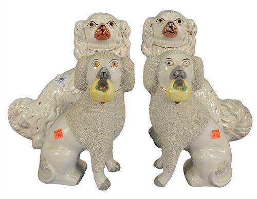 TWO PAIRS OF STAFFORDSHIRE DOGS,