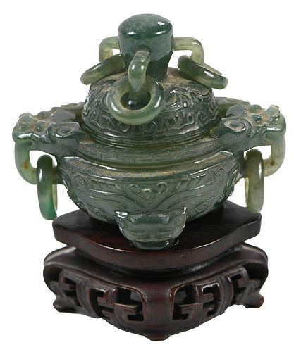 A SMALL CHINESE CARVED GREEN JADE