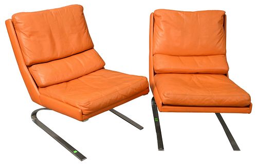 PAIR OF MID CENTURY LEATHER UPHOLSTERED 379490