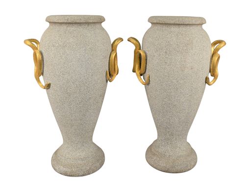 PAIR OF STONE URNS, HAVING GILT