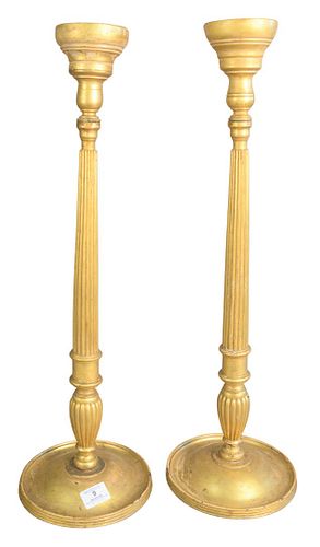 PAIR OF TALL GILTWOOD CANDLESTICKS,