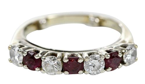 14KT DIAMOND AND RUBY RINGfour 37c4ca