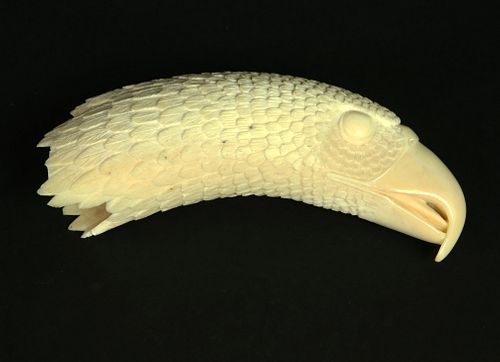 ANTIQUE CARVED "EAGLE HEAD" TOOTHAntique