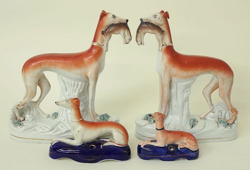 PAIR OF STAFFORDSHIRE POTTERY GREYHOUNDS