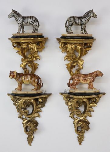 FOUR CARVED GILT BRACKETS WITH