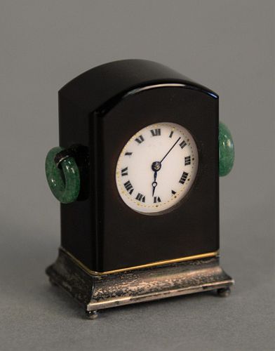 MINIATURE CLOCK HAVING CASE WITH