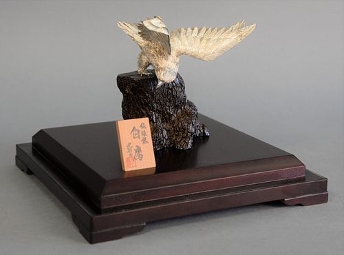 JAPANESE SILVER FALCON ON CARVED