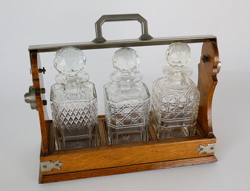 OAK AND CRYSTAL TANTALUS SET, 19TH