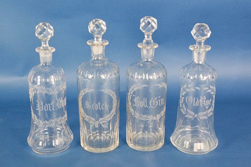 SET OF 4 ENGRAVED CRYSTAL DECANTERS,
