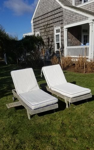 TWO OUTDOOR TEAK CHAISE LOUNGES 37f0c9