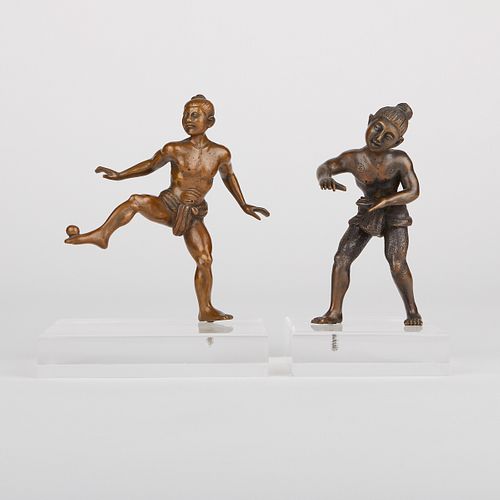 PAIR OF BURMESE BRONZE BALL PLAYERS