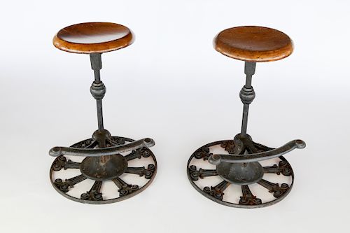 PAIR OF CAST IRON AND WALNUT SWIVEL 37ff9b