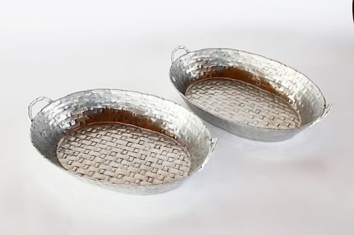 PAIR OF POLISHED ALUMINUM OVAL