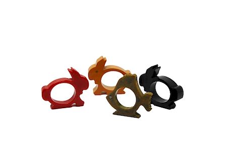 4 BAKELITE NAPKIN RINGS 3 RABBITS 37dcea