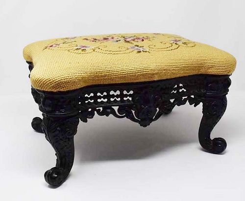 FOOTSTOOL WITH ORNATE CAST IRON