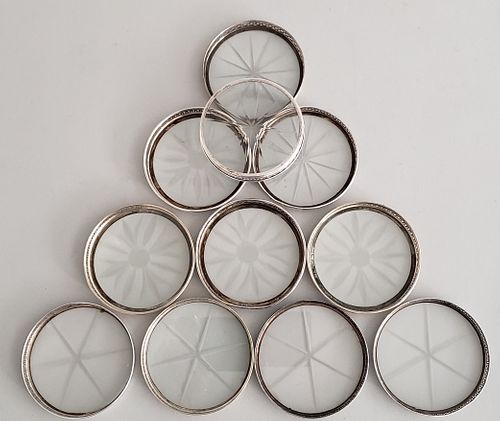 11 STERLING SILVER AND CRYSTAL COASTERS11