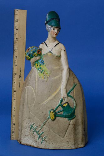 CAST IRON PAINTED DOORSTOP OF A