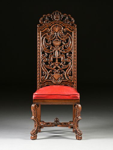 A CHARLES II STYLE CARVED WALNUT
