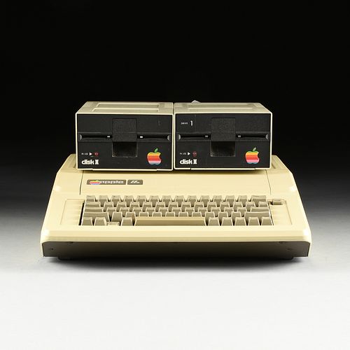 AN APPLE IIE COMPUTER WITH TWO