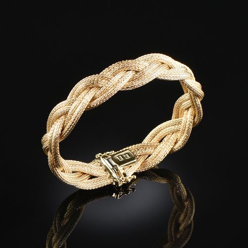 AN 18K YELLOW GOLD GUCCI BRACELET,AN