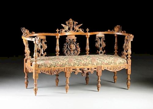 A RENAISSANCE REVIVAL CARVED WALNUT