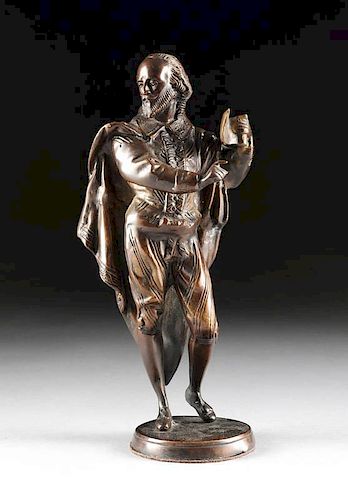 A PATINATED BRONZE SCULPTURE OF 381c8e