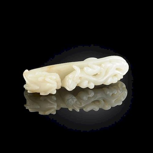 A CHINESE CARVED CELADON JADE BELT 381c90